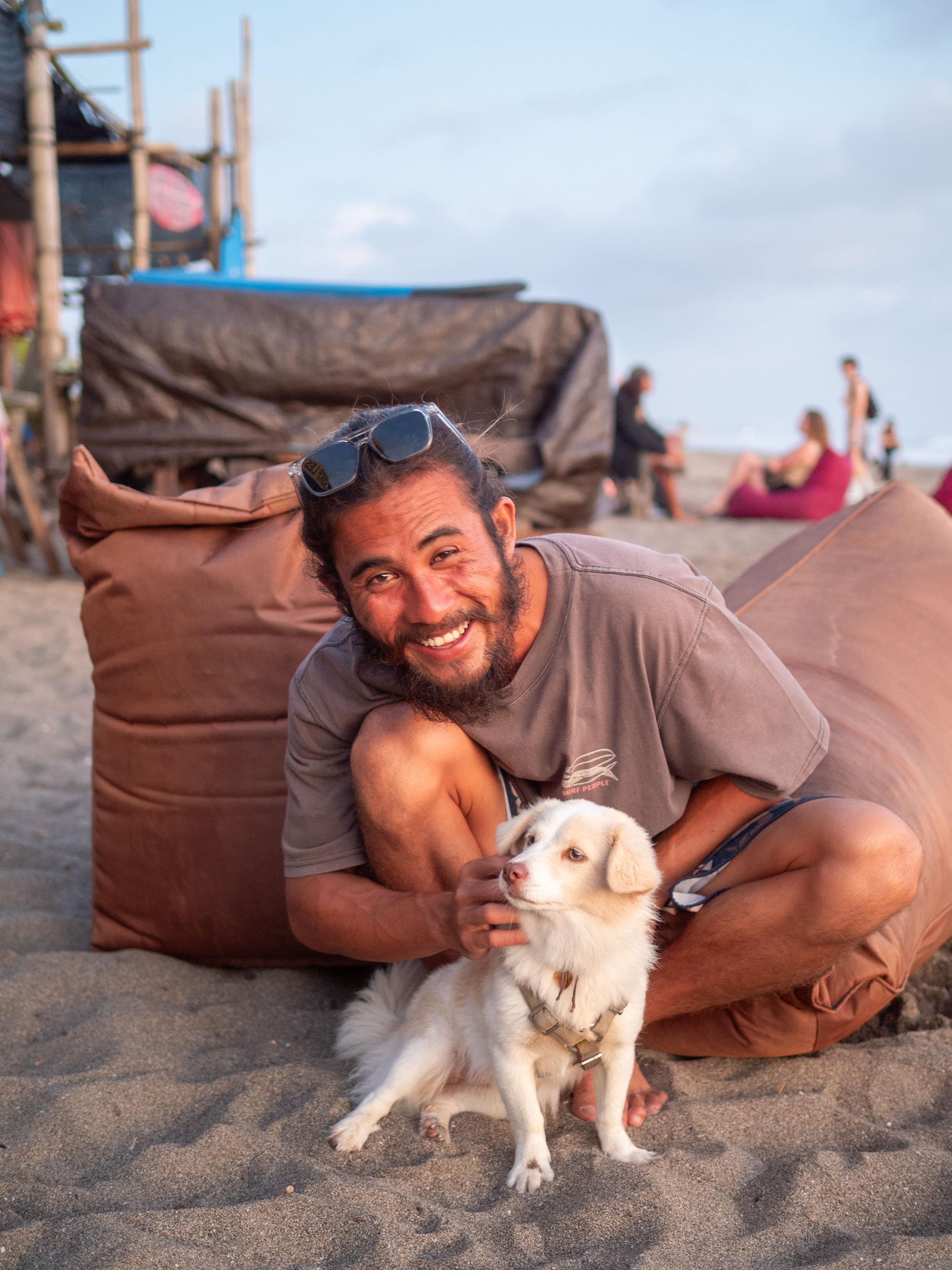 Billy with his dog Kuaci at Berawa Beach